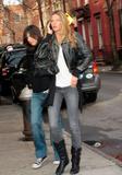 Gisele Bundchen in black leather jacket