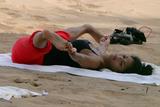 Nicole Scherzinger - Candids Doing Joga, Hawaii Beach