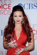 http://img158.imagevenue.com/loc134/th_442542872_DemiLovato01112012PeoplesChoiceAwards_PressRoom9_122_134lo.jpg